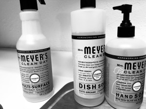 a black and white photo of natural cleaning products by mrs meyers