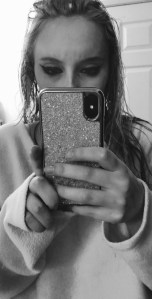 a black and white close up photo showing the veins above my eyebrows bulging 