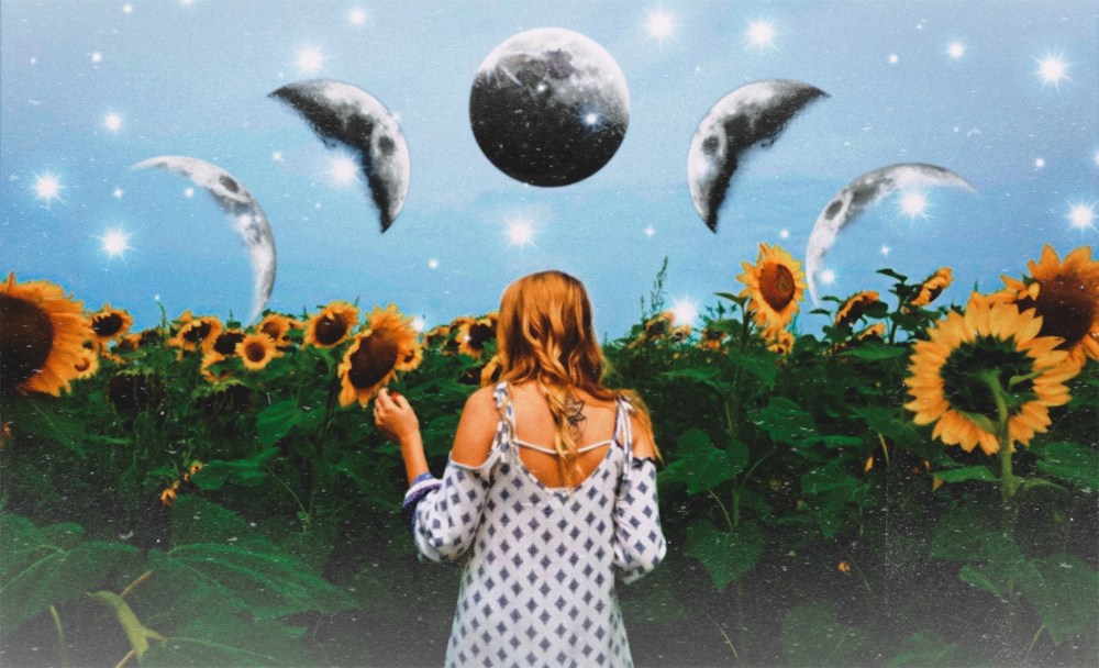 photo of blonde girl in white dress facing a sunflower field. above her is the moon in various phases, directly above her head is the full moon.